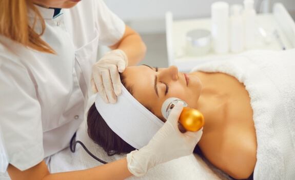 man grabbing nose and grimacing